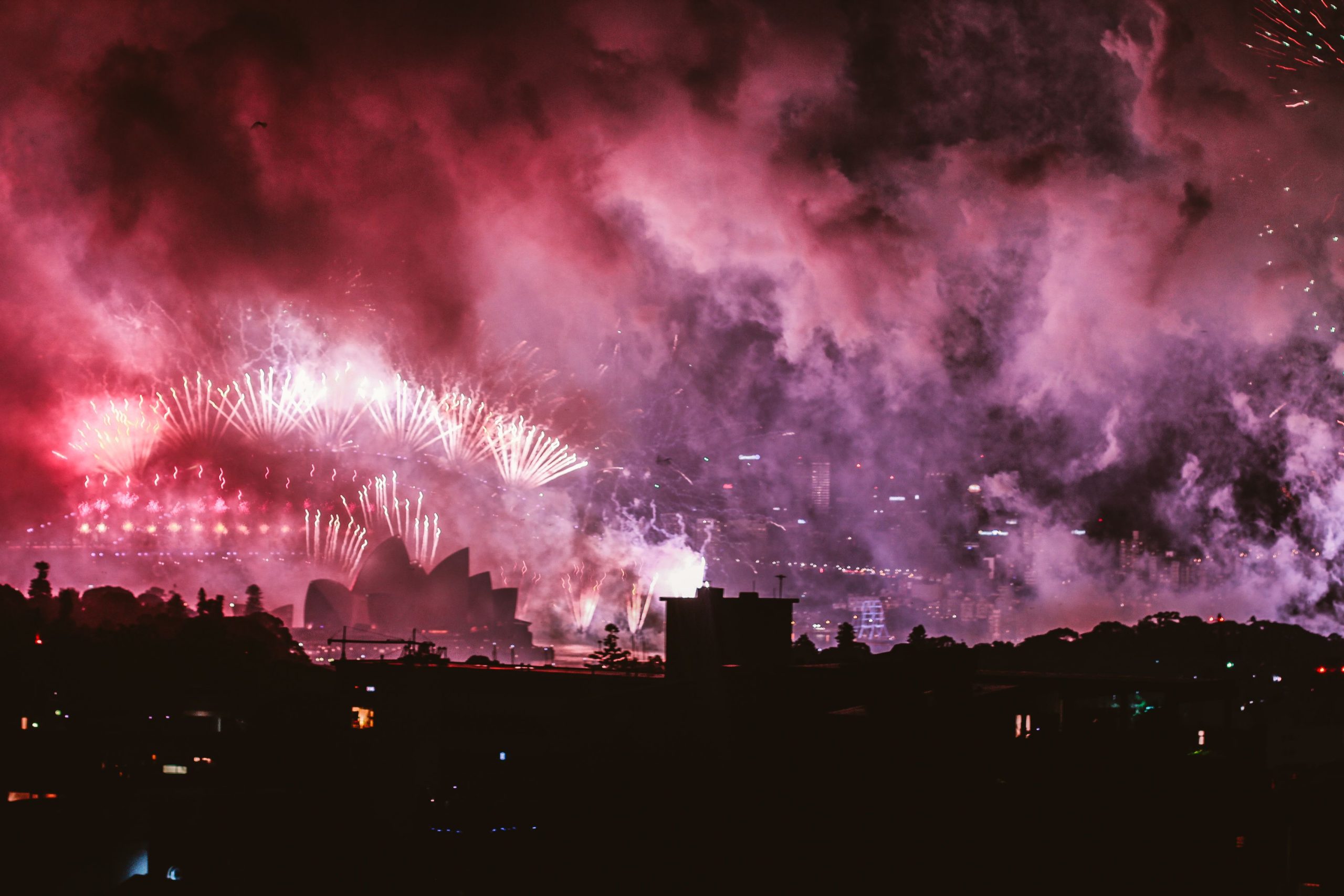 Dazzling fireworks illuminate the Sydney Opera House and Harbour Bridge during New Year's Eve celebrations